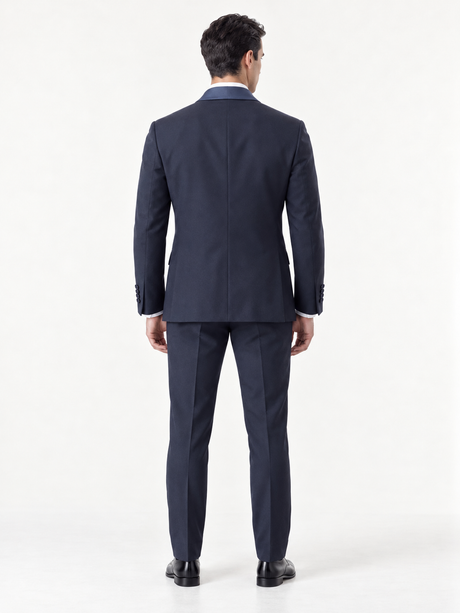 Model wearing the Nocturne Navy suit, back view